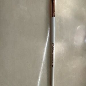 White Makeup Brush with Gold Accents
